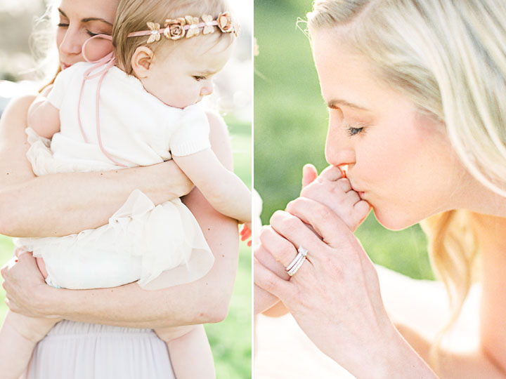 Mom kisses her daughters fingers during their Frisco Family Photographer session
