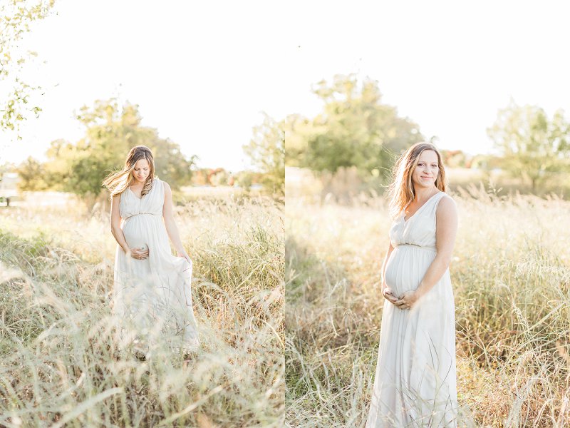 A pregnant woman holds her bump and is filled with joy