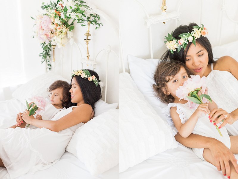 A Mother and daughter sit together in a light and airy space during their Dallas Mommy and Me Photography session
