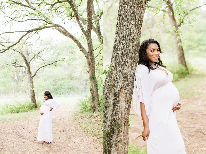 Shurrekia casually leans against a tree in a pink bohemian maternity dress