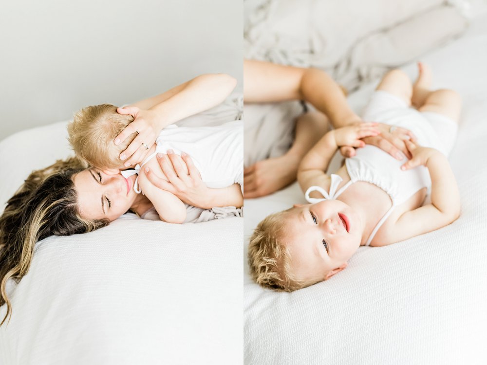 A mother wraps her arms around her son and holds her close during their Dallas Baby Photographer Session 
