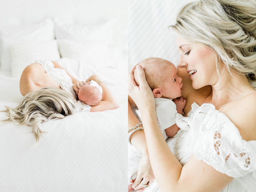 Mom snuggling newborn baby in white and bright newborn photos