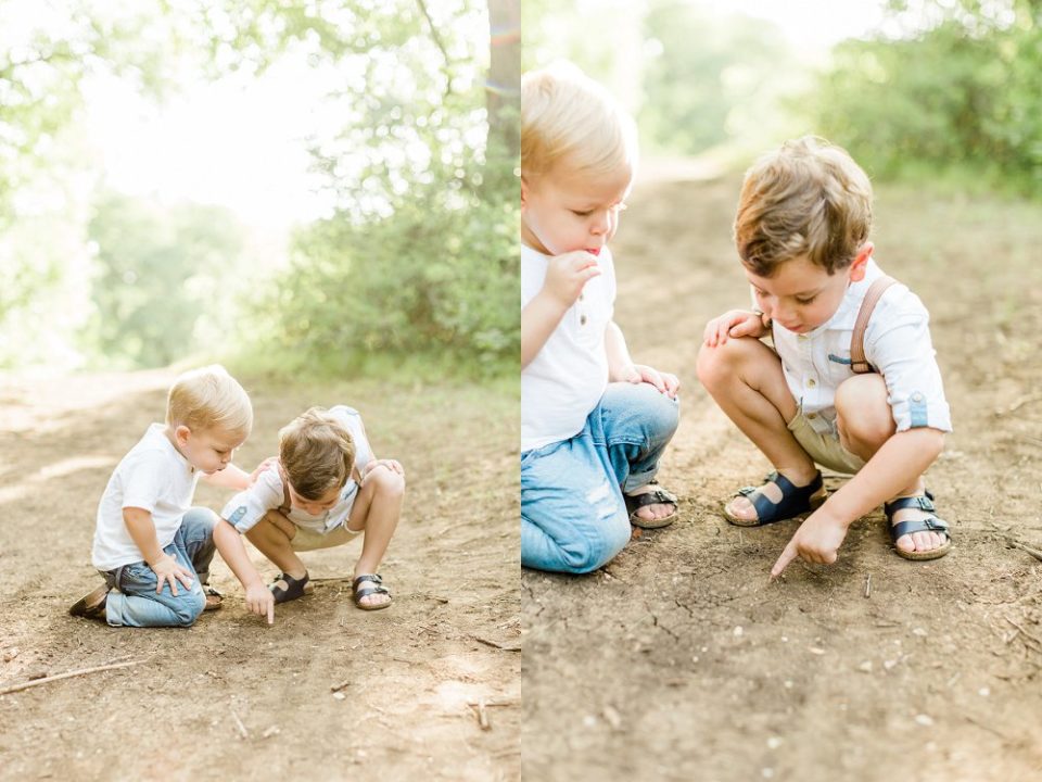 Photo of two brothers playing in the dirt
