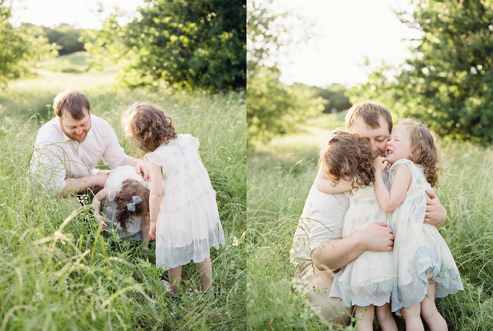 A young Dad is smothered in kisses by his two toddler daughters